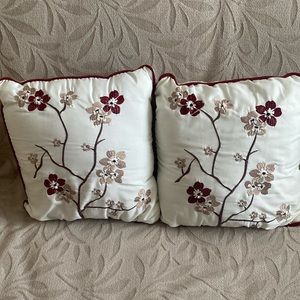 Two small ornamental pillows